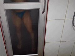 Sensual milf shows off her wet feet as she takes a dip in the sauna